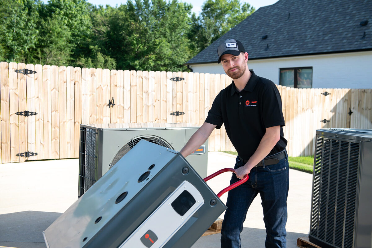 HVAC technician checking equipment